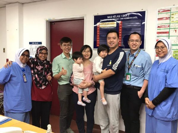The Chinese girl, her family and hospital officials