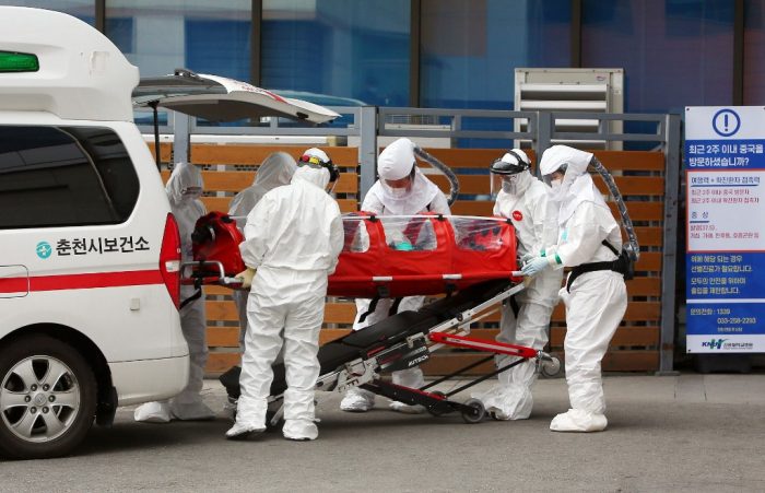 A coronavirus patient and doctors in South Korea