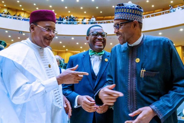 Buhari all smiles, with Akinwumi Adesina and President Issoufou of Niger