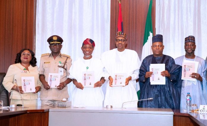Buhari, middle, with Minister of Interior, Rauf Aregbesola and Senator Shettima , 2nd right and other officials