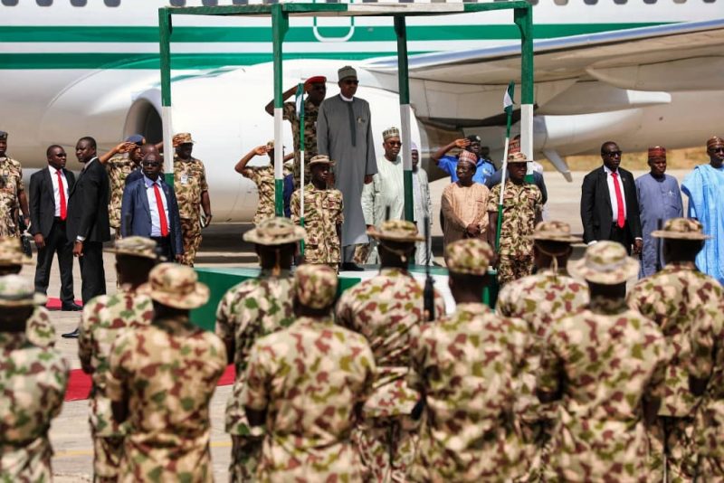 Buhari reviews the troops