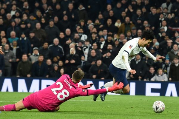 Tottenham’s Son Heung-min brought down by Southampton’s keeper