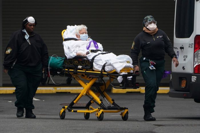 A coronavirus patient being stretchered away in US