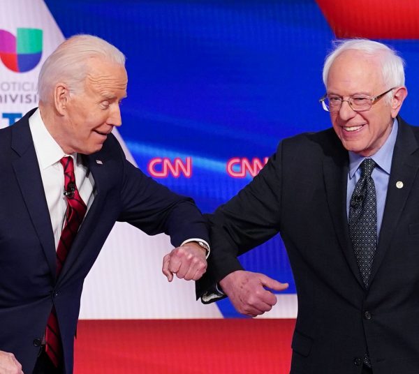 Biden, Sanders try the elbow shake