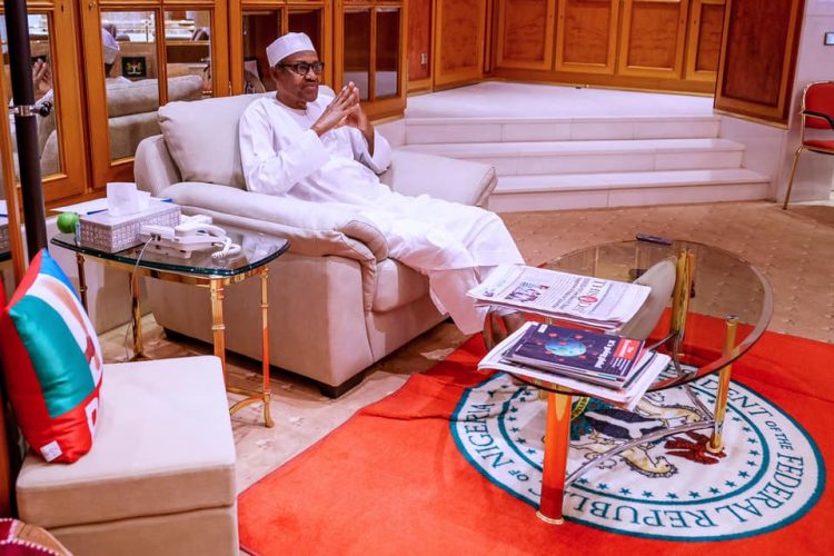 Buhari in Aso rock during the briefing