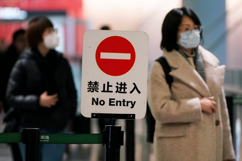 China restricts entry for foreigners