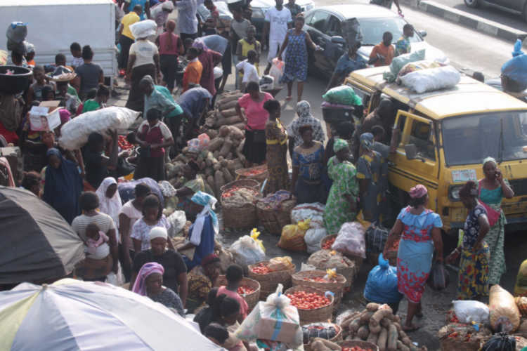 Last minute Shoppers at the Lagos Food Market in Mile 12 before the curfew