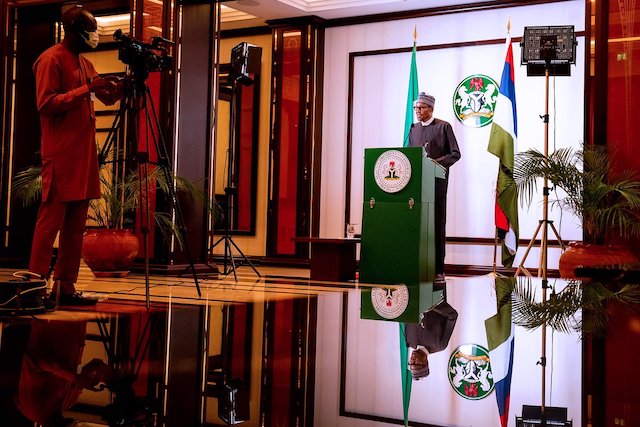 President Buhari. Traducers say the four-colour flag is Cuba’s