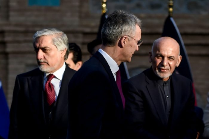 Two presidents, Abdullah Abdullah (L) and President Ashraf Ghani (R), with NATO secretary NATO Secretary General Jens Stoltenberg
