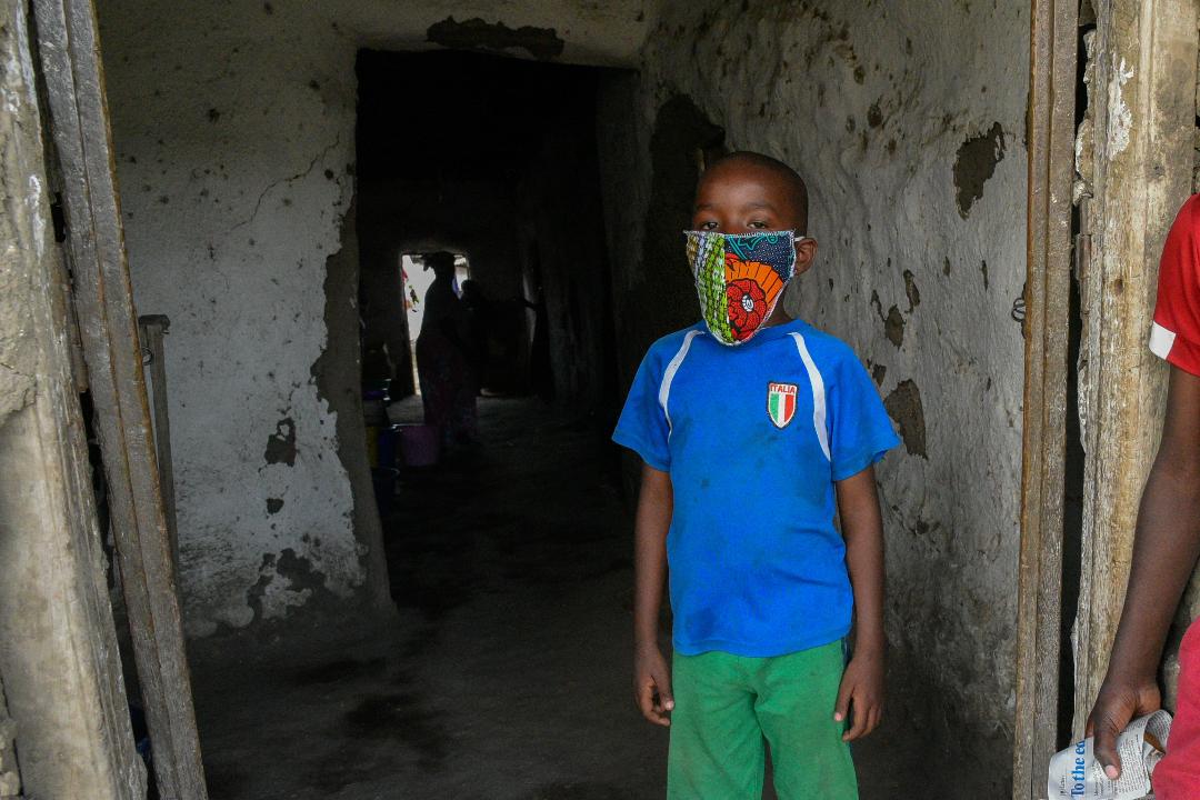 A boy with a home-made face mask at Bondeni Slum in Nakuru County, Kenya,