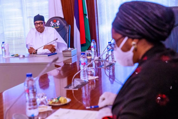 President Muhammadu Buhari receiving briefing from the Minister of Finance, Budget and National Planning, Zainab Ahmed at the State House, Abuja.
