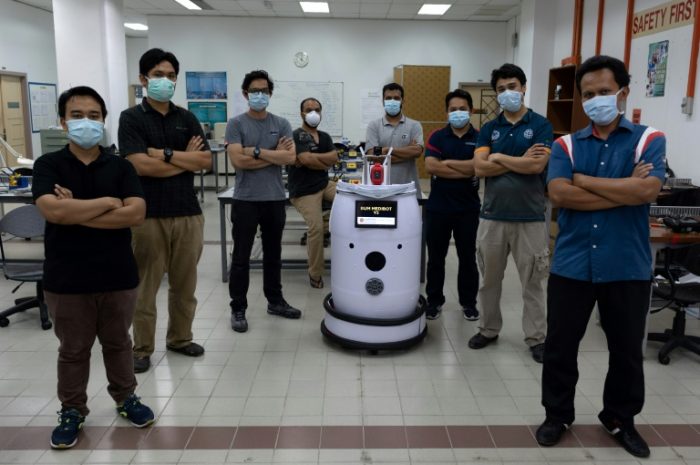Malaysian scientists with the Medibot