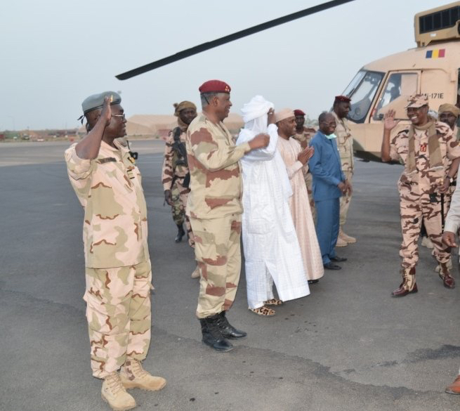 President Idris Deby , right , arrives in Ndjamena after Boko Haram campaign