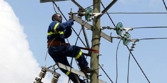 A worker of the Kenya Power and Lighting company