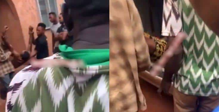 Ekpoma suicide:Combo photo from viral video shows the man being taken away