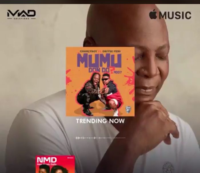 Charly Boy with the cover for the song Mumu Don Do MMD