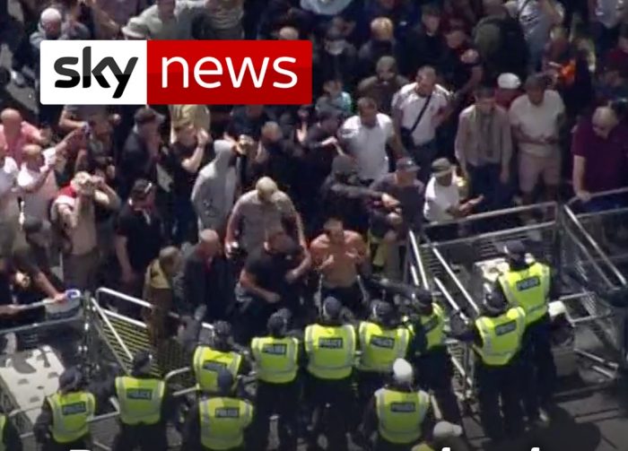 Screen grab from Sky News shows far-right groups in a clash with police at White Hall on Saturday