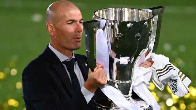 Zinedine Zidane with La Liga trophy on Thursday night