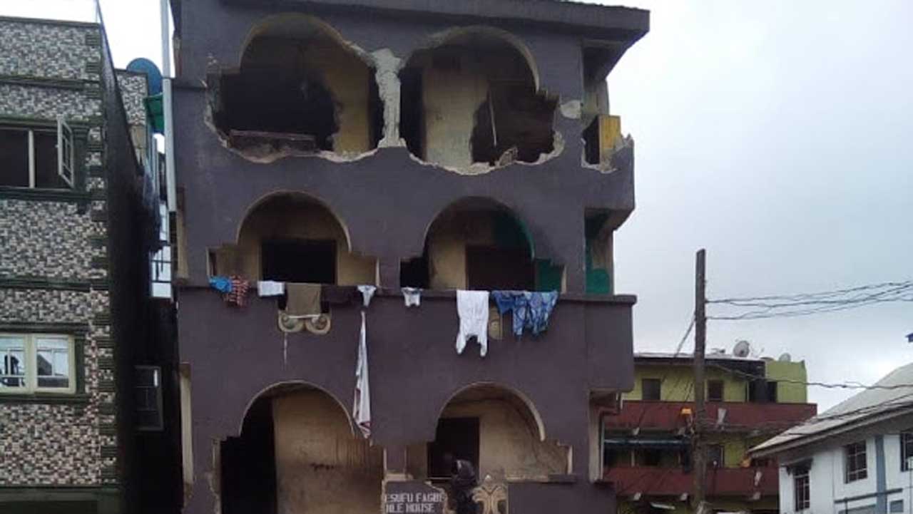 A distressed building waiting for demolition in Lagos.