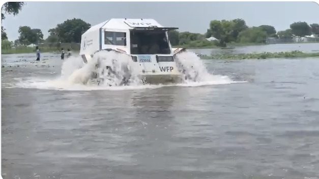 A WFP amphibious vehicle plodding through the flooded areas of South Sudan