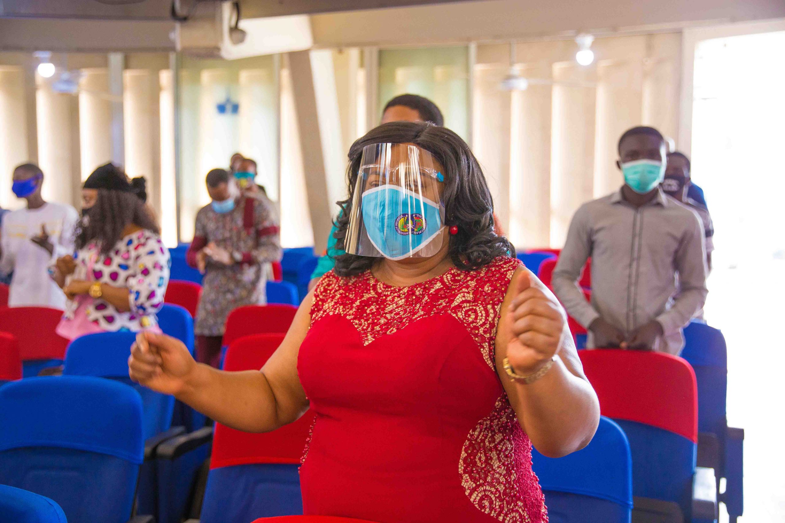 A church attendee putting on face mask and shield to prevent the spread of Coronavirus, earlier today in Lagos