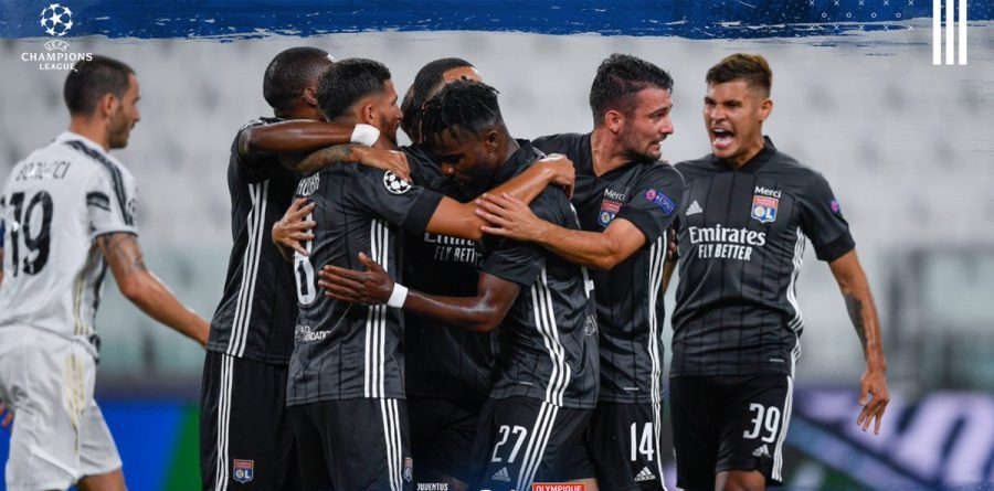 Lyon players rejoicing after beating Juventus