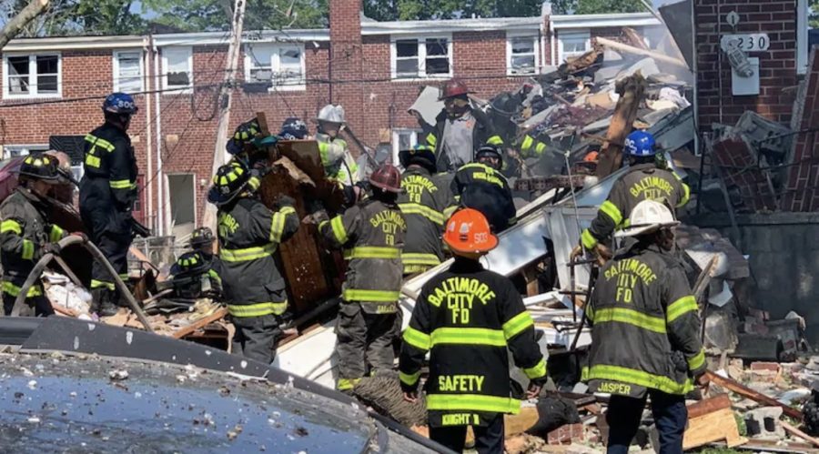 Firefighters in the Baltimore neighborhood where the explosion occurred