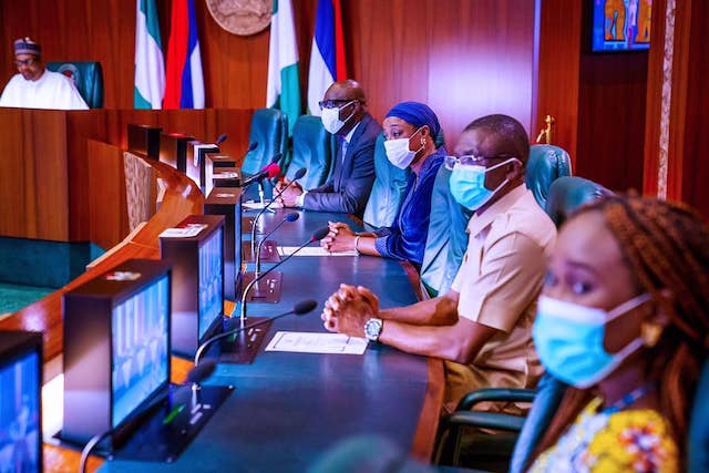 Buhari, far left, at the meeting with Obaseki, his deputy Shaibu and their wives