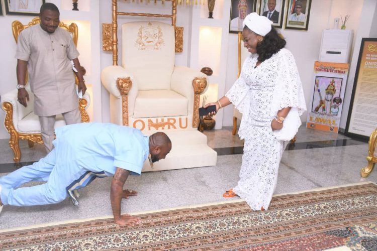 Davido prostrates before Olori Mariam Lawal
