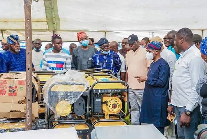 Oyetola with cabinet members inspect some of the looted items