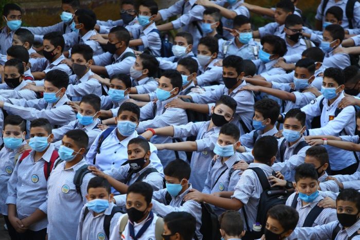 Pupils in Cairo, Egypt use face masks to ward off COVID-19 infections
