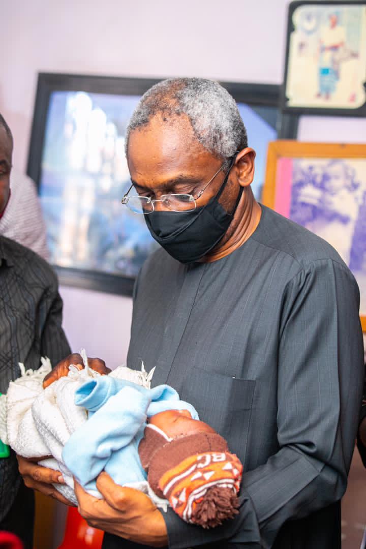 Speaker Femi Gbajabiamila, holding Okereke's baby