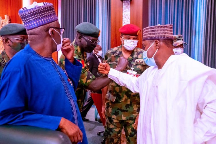 Chief of Army Staff, Tukur Buratai with others at the meeting