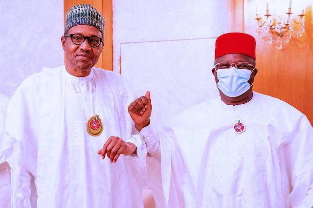 Buhari and Umahi greet