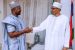 President Buhari congratulates Minister Sunday Dare, on the conferment of Sarkin Wasanni by the Emir of Daura, Alhaji Umar Farouk Umar.