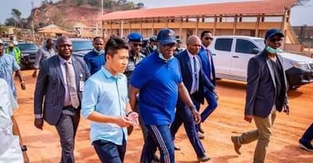 Governor Kayode Fayemi with one of the Chinese working on Ado Ekiti-Iyin Road