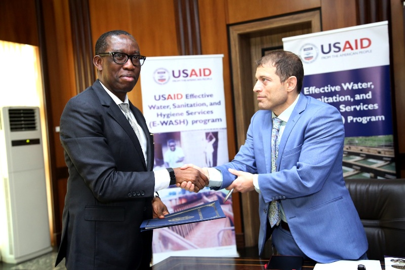 Mr Colin Dreizin of USAID with Delta State governor Okowa