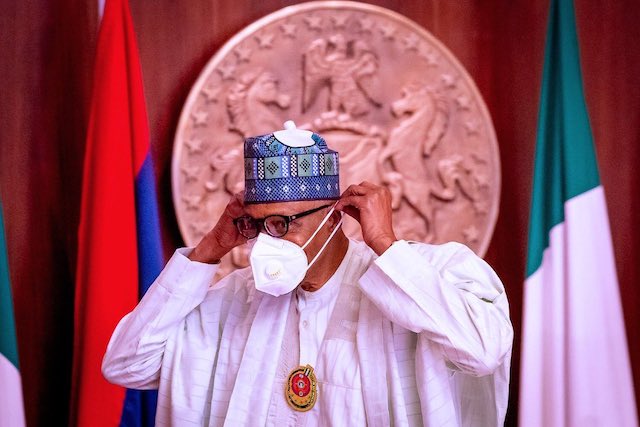 President Buhari not taking chances with COVID-19 as he wears a mask