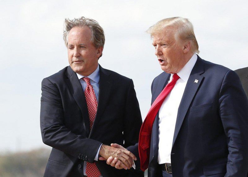 Texas attorney-general Ken Paxton with outgoing US President Trump