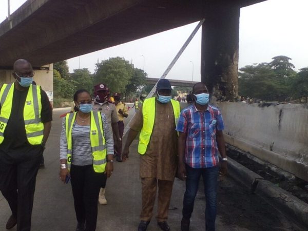 Federal and Lagos state officials inspect the bridge