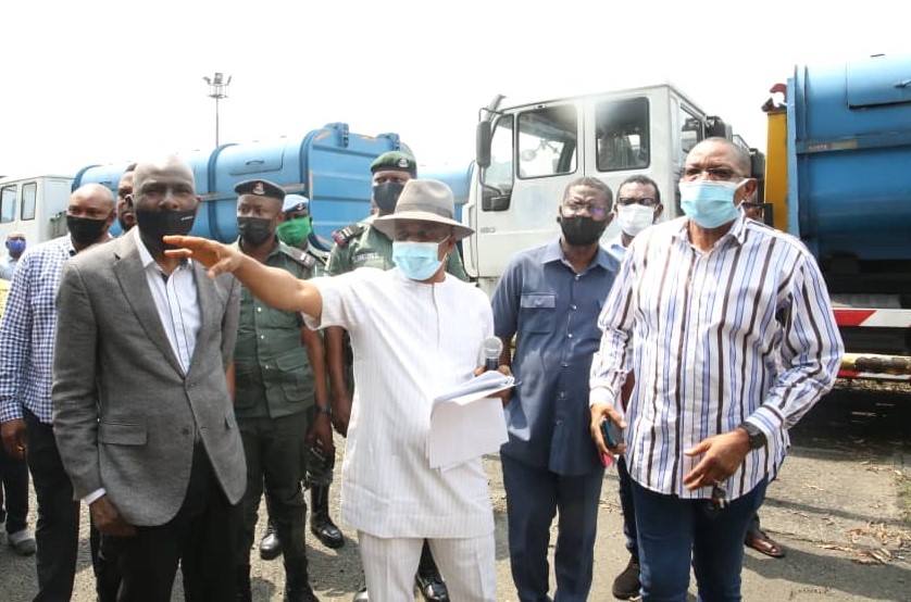 NDDC-Interim-Administrator-Efiong-Akwa-inspecting-waste-disposal-trucks-to-be-distributed-to-9-Niger-Delta-states