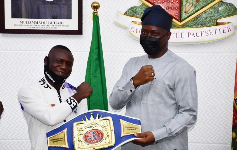 Seyi Makinde and the boxing champ called scorpion