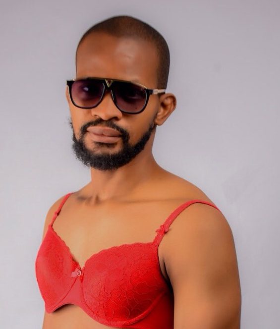 Actor Uche Maduagwu poses in a red female panty and bra for his