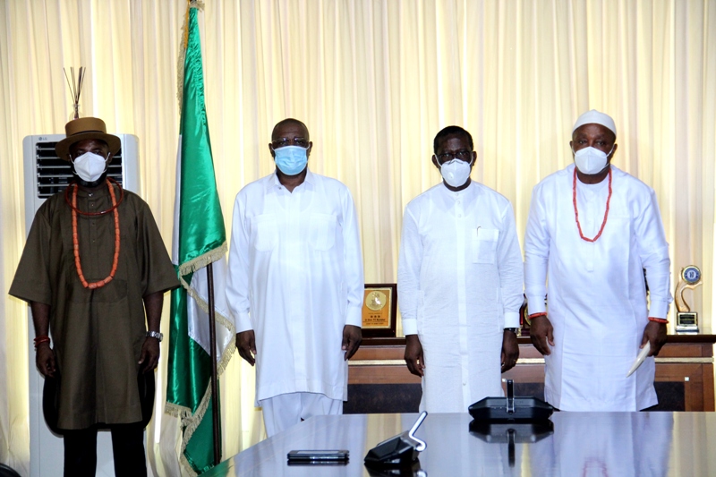 Okowa, second right with the two special advisers, Obidi and Clark