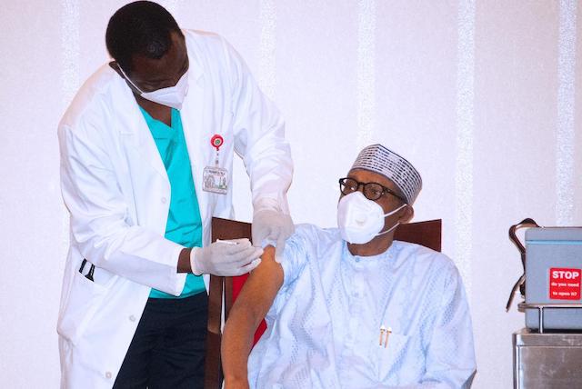 Buhari taking the AstraZeneca:Oxford COVID-19 vaccine