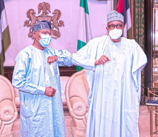 Buhari with Ibn Chambas in Abuja on Thursday. Photo Sunday Aghaeze