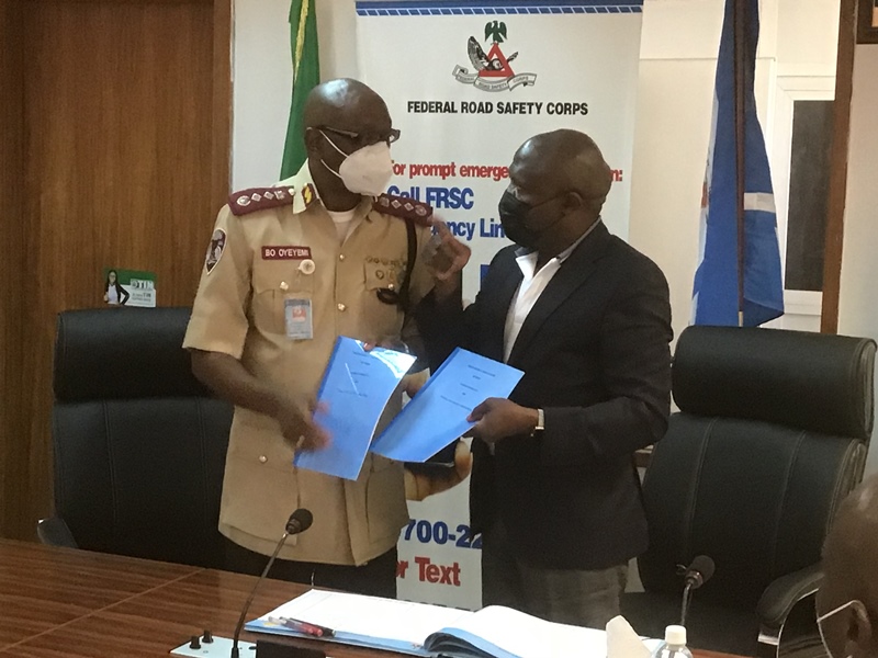 FRSC-boss-Oyeyemi-exchanging-the-signed-MoU-with-MD-of-Guinness-Nigeria-PLC-Mr-Baker-Magunda