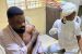 Kunle Afolayan receives fist dose of COVID-19 vaccine.