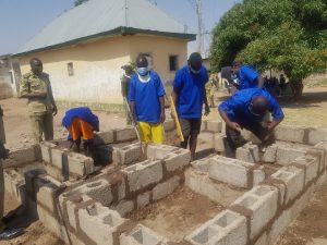 Some inmates at the Billiri Correctional Centre undergoing training on building