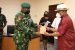 Governor Wike (right) receives a plaque from COAS, Lt. General Ibrahim Attahiru during the latter's courtesy call at the Government House, Port Harcourt on Tuesday. Wike tells Attahiru that his predecessor, Tukur Buratai, was grossly partisan